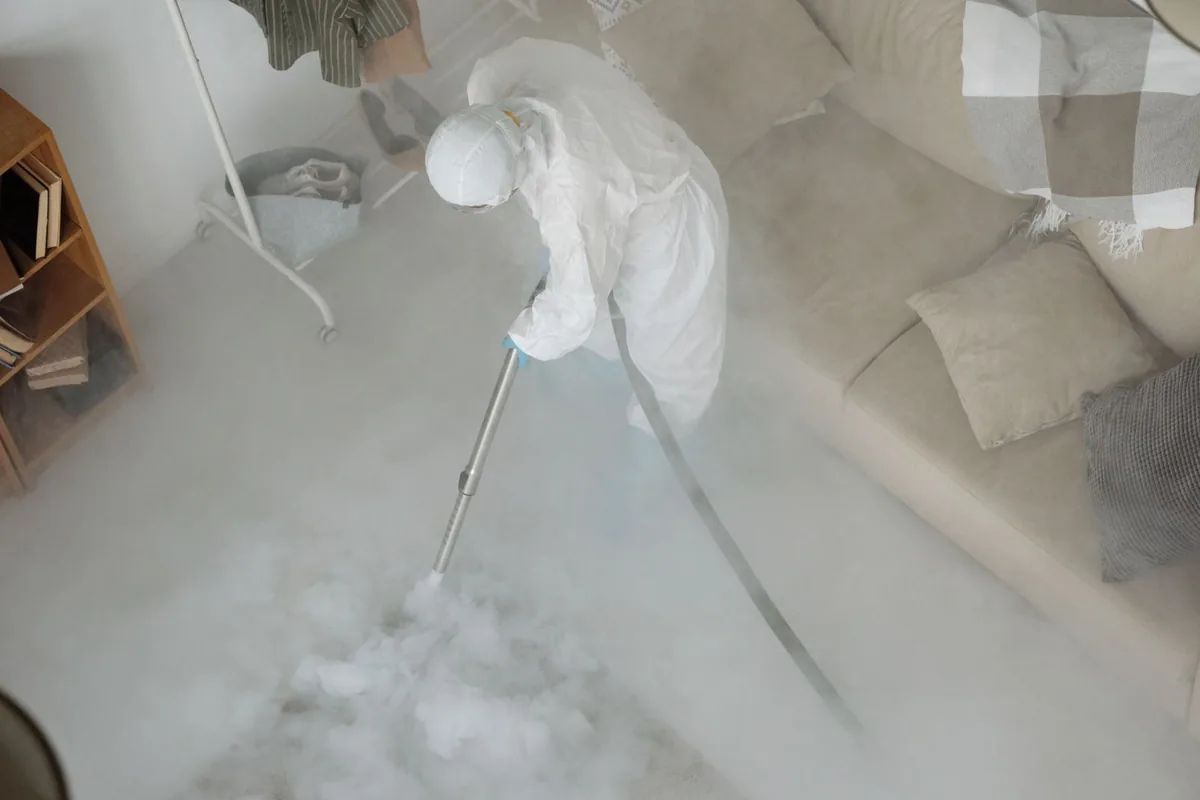 Biohazard cleanup technician in protective equipment, Clayton, GA